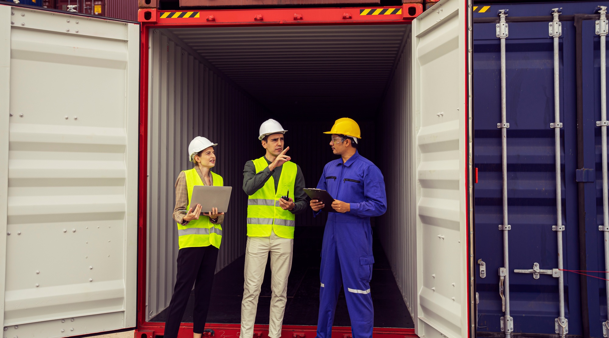 Container operator explaining operations to the data department. Import, Export, Logistic, Transport